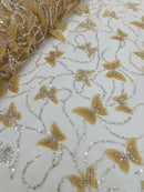 3D Beaded Butterfly Embroidered On A Mesh Fabric| New Creations Fabric & Foam Inc. - New Creations Fabric & Foam Inc