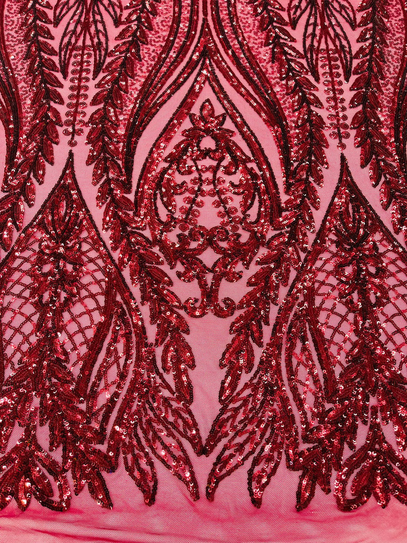 Damask design with sequins embroider on a 4 way stretch mesh fabric.