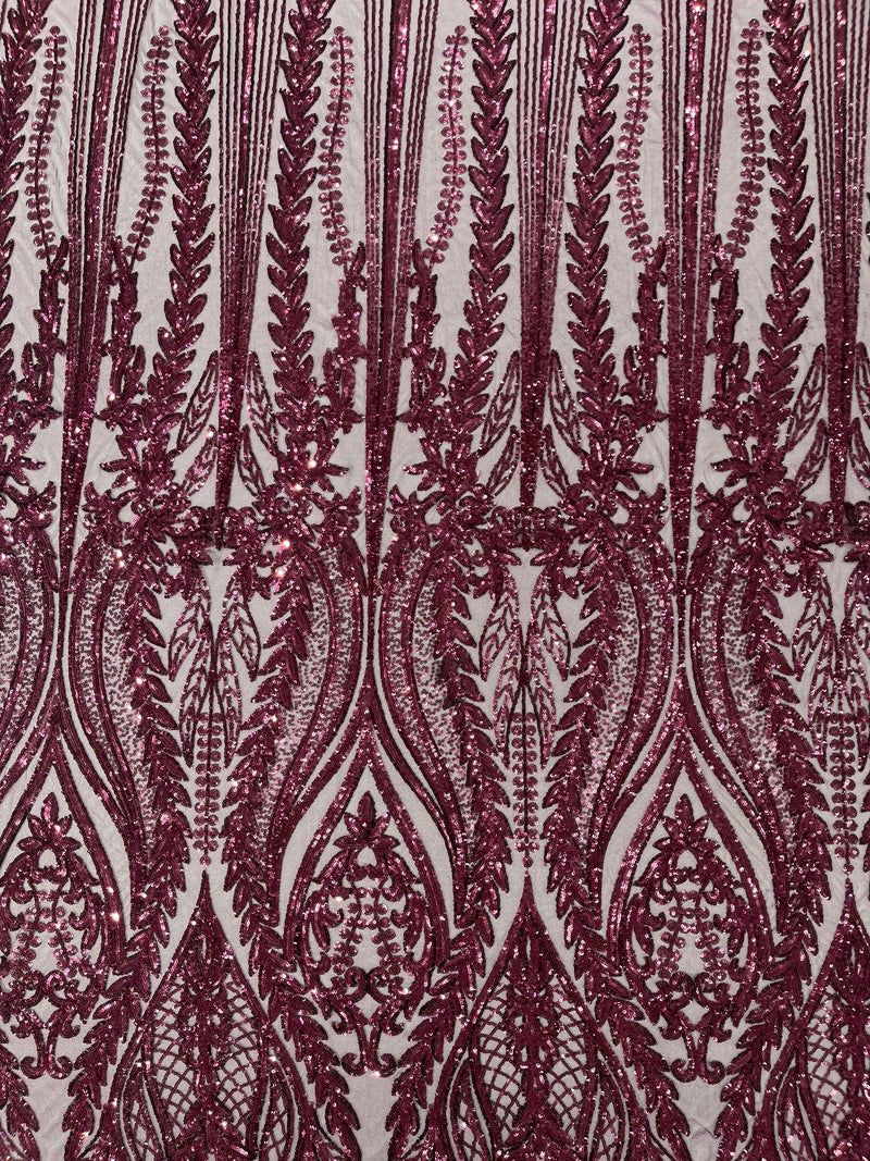 Damask design with sequins embroider on a 4 way stretch mesh fabric.