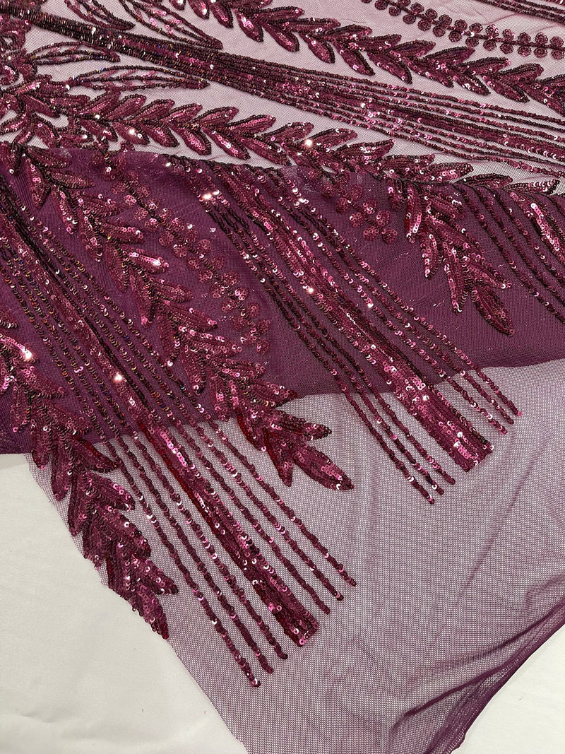 Damask design with sequins embroider on a 4 way stretch mesh fabric.