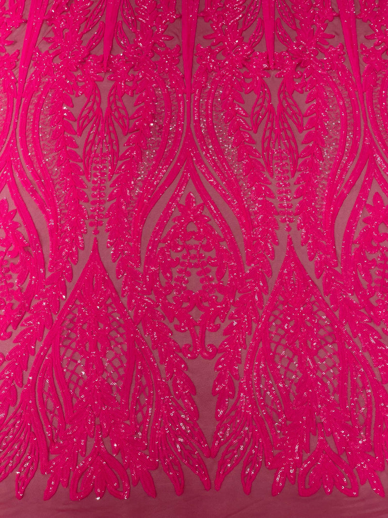 Damask design with sequins embroider on a 4 way stretch mesh fabric.