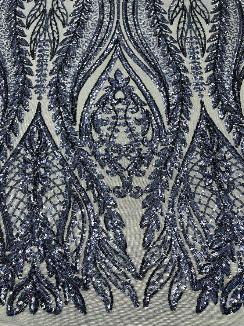 Damask design with sequins embroider on a 4 way stretch mesh fabric.