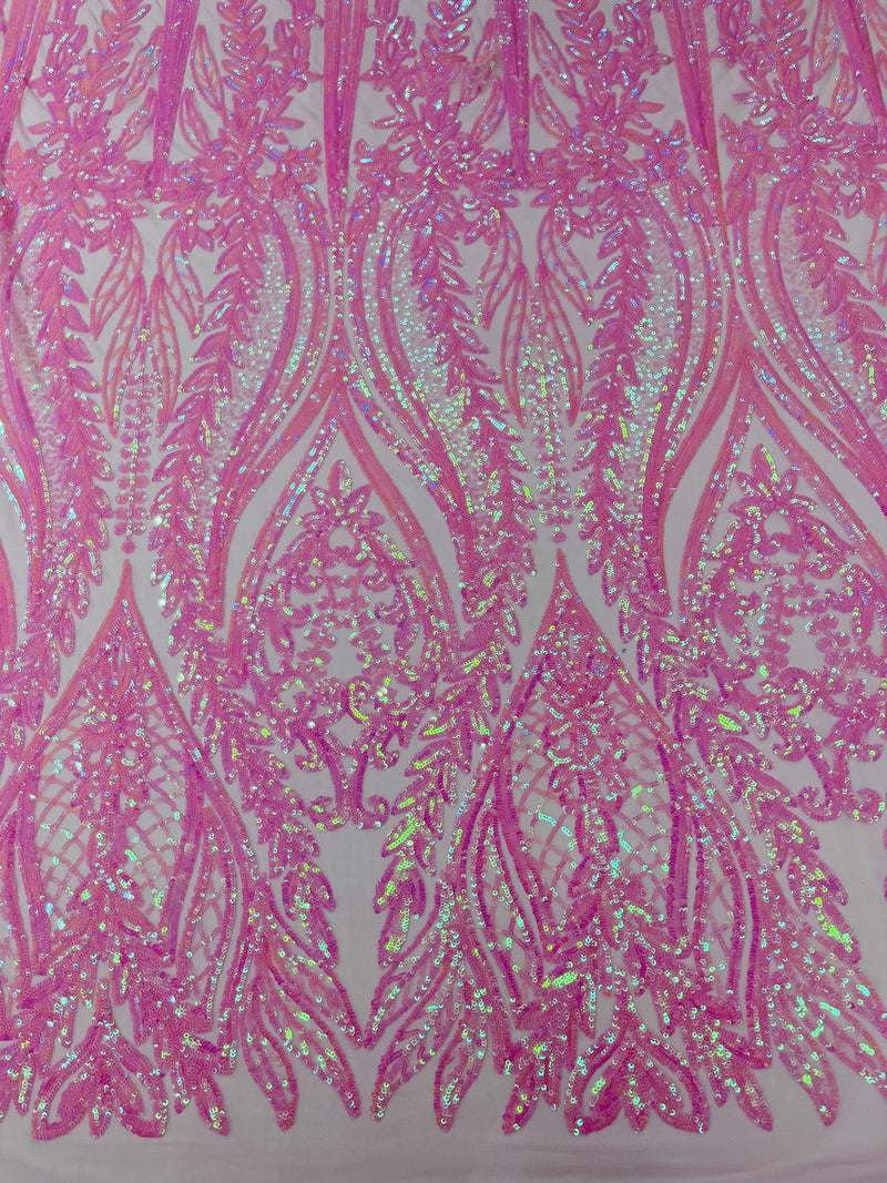 Damask design with sequins embroider on a 4 way stretch mesh fabric.