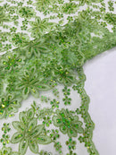 Metallic floral lace design embroidered 54" Wide | New Creations Fabric & Foam Inc.