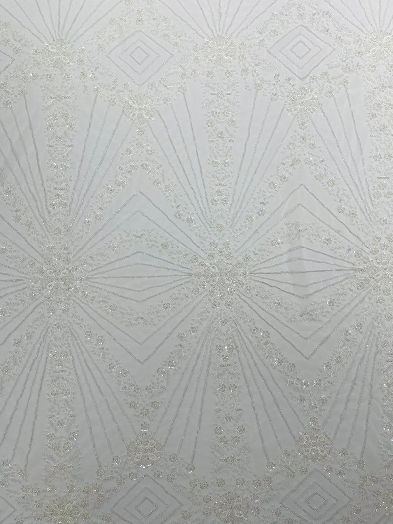 Luxury Bridal Fabric with Geometric Beading on a mesh, by The Yard.