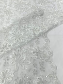 Metallic floral lace design embroidered 54" Wide | New Creations Fabric & Foam Inc.