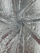 Foil leopard print on a stretch spandex fabric | New Creation Fabric & Foam - New Creations Fabric & Foam Inc