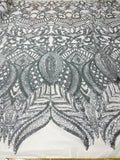 New Royalty sequin design on a 4 way stretch mesh fabric-sold by the yard.