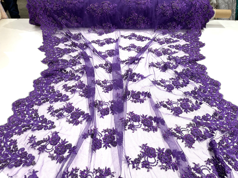 Purple elegant hand beaded flower design embroider on a mesh lace-prom-sold by the yard.