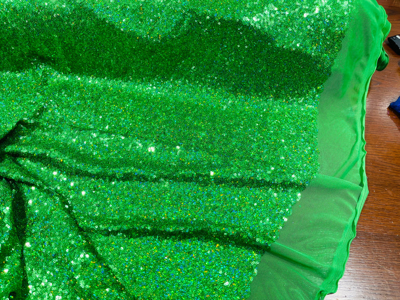 Kelly Green Iridescent Mini Glitz Sequins on a 4 Way Stretch Mesh-Sold By The Yard.