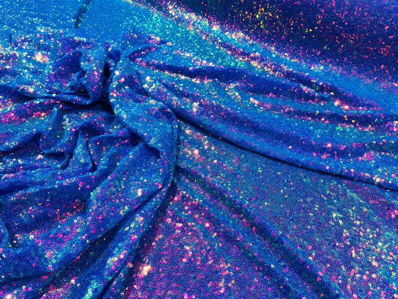 Purple Iridescent Mini Glitz Sequins on a Turquoise 4 Way Stretch Mesh-Sold By The Yard.