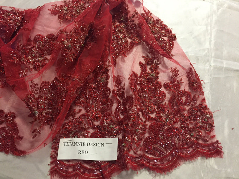 Red flowers embroider and heavy beaded on a mesh lace fabric-sold by the yard-