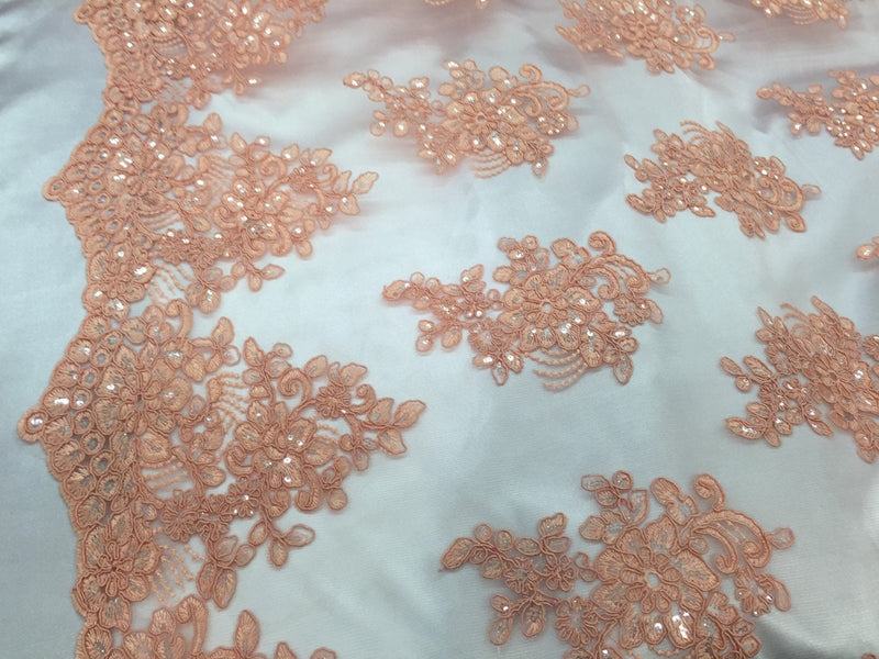 Peach flower lace corded and embroider with sequins on a mesh.wedding/bridal/prom/nightgown fabric. Sold by the yard.