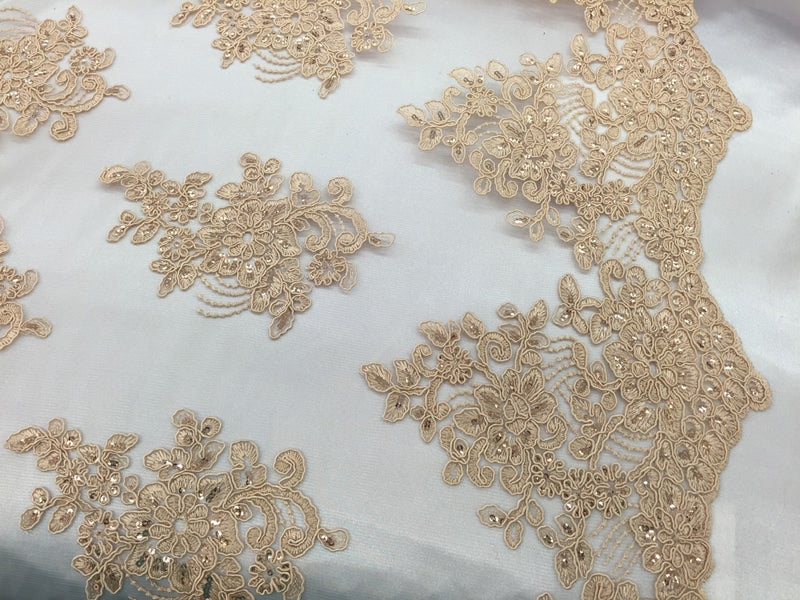 Champagne flower lace corded and embroider with sequins on a mesh. Wedding/bridal/prom/nightgown fabric. Sold by the yard.