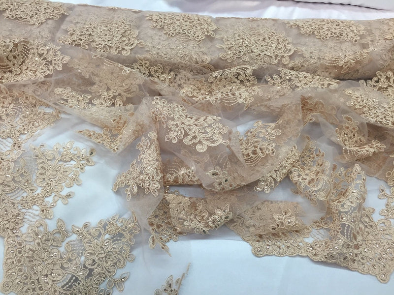 Champagne flower lace corded and embroider with sequins on a mesh. Wedding/bridal/prom/nightgown fabric. Sold by the yard.