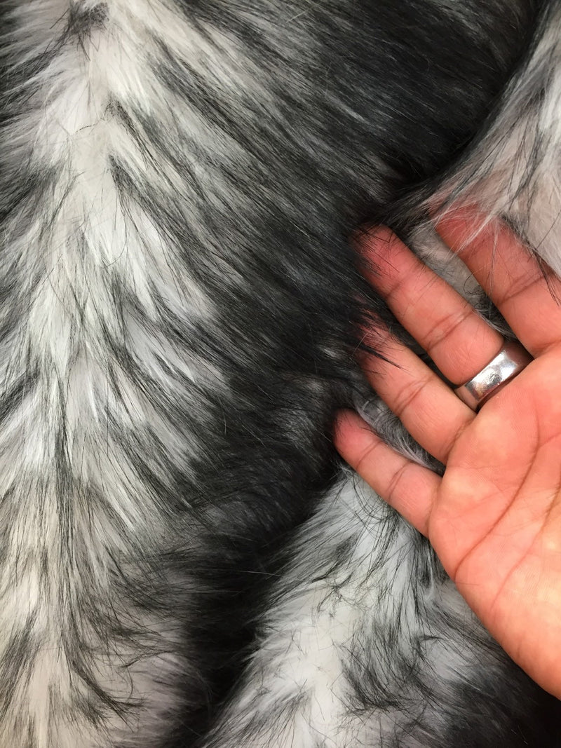 White/black husky faux fur, 2 tone shaggy faux fur. Sold by the yard.60" wide.