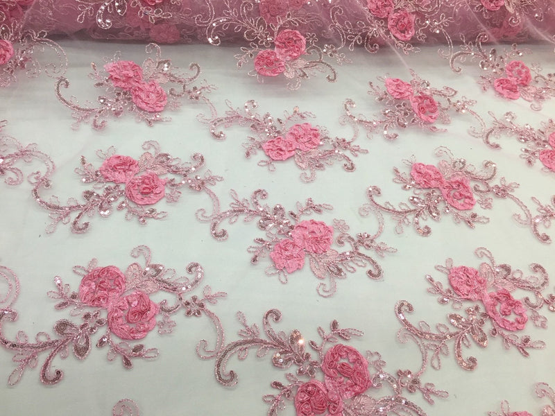 Pink 3d flowers embroider with sequins on a mesh lace fabric. Sold by the yard.