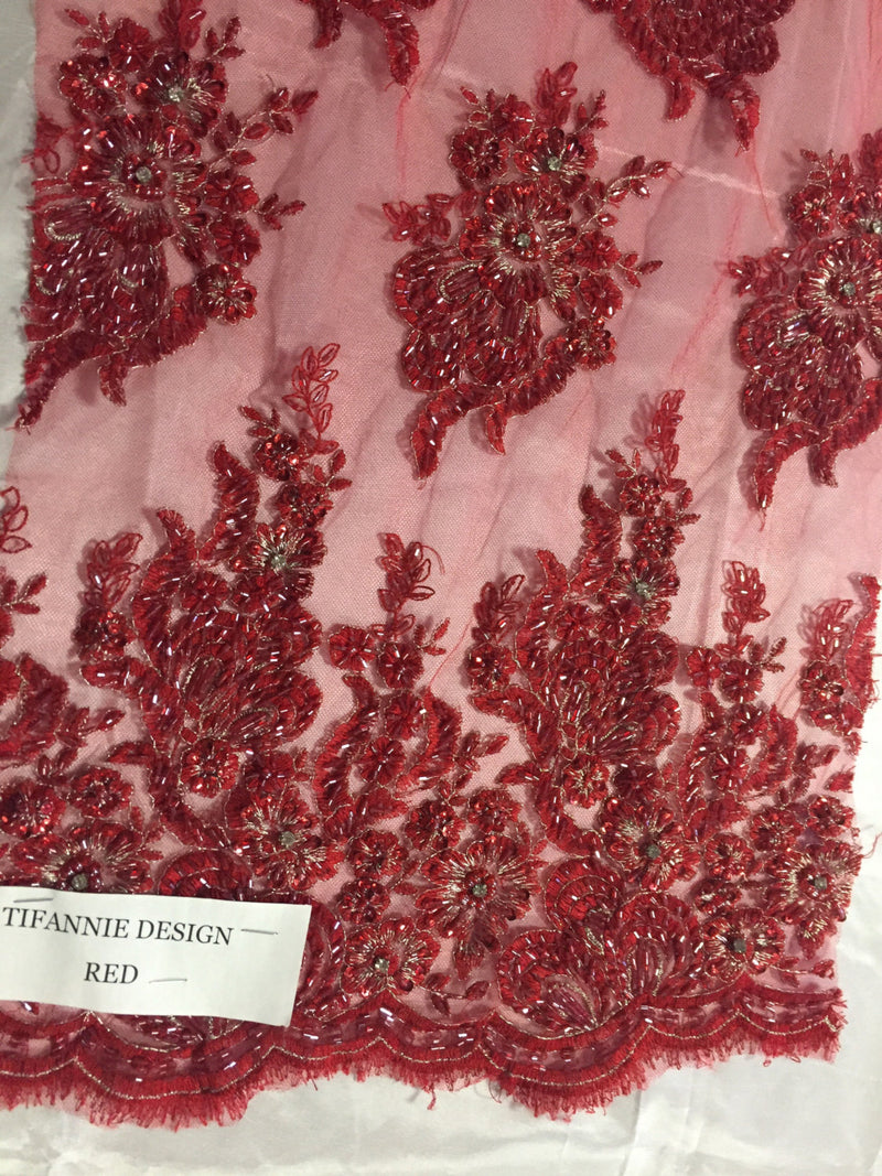 Red flowers embroider and heavy beaded on a mesh lace fabric-sold by the yard-