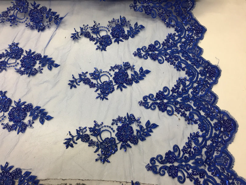 Elegant royal blue hand beaded flower design embroider on a mesh lace-prom-nightgown-bridal-wedding-sold by the yard.