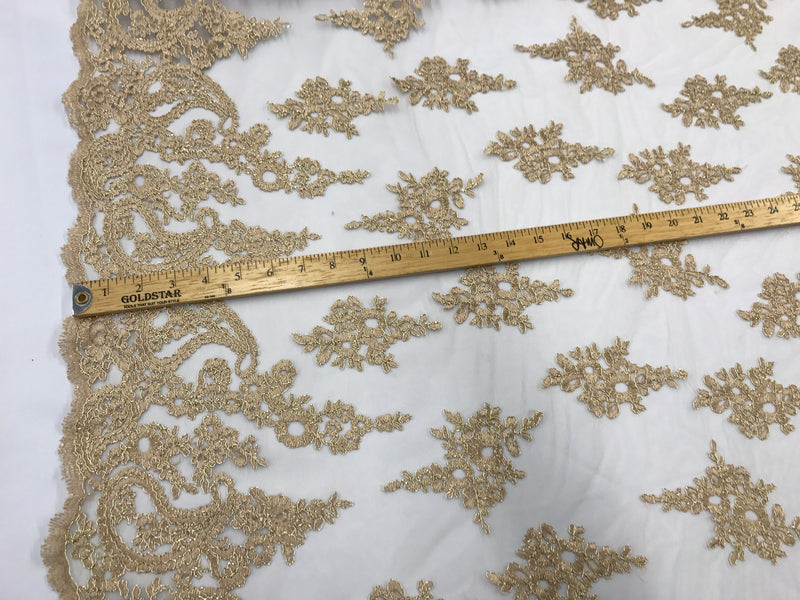 Gold paisley flower embroider and corded with a metallic gold tread on a mesh lace-wedding-bridal-prom-nightgown-decorations- sold by yard.