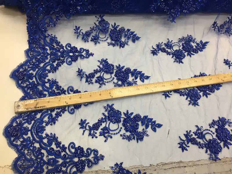 Elegant royal blue hand beaded flower design embroider on a mesh lace-prom-nightgown-bridal-wedding-sold by the yard.