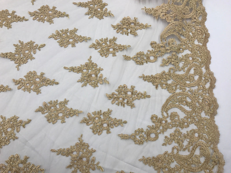 Gold paisley flower embroider and corded with a metallic gold tread on a mesh lace-wedding-bridal-prom-nightgown-decorations- sold by yard.