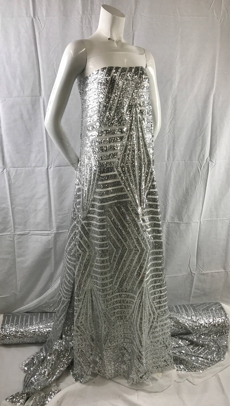 Geometric design embroider with silver sequins on a white mesh-fashion-decorations-nightgown-dresses-sold by the yard.