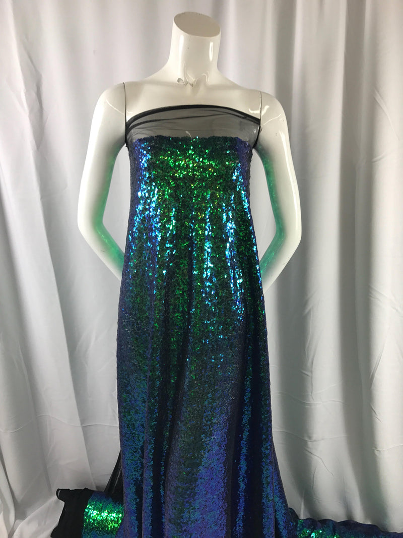 Green/purple iridescent mermaid fish scales-mini sequins embroider on a black mesh fabric-fashion-decorations-dresses-sold by the yard-