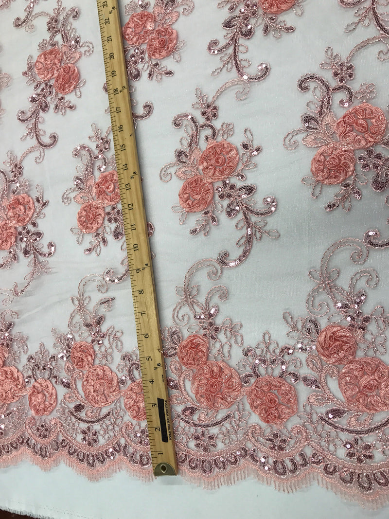 Blush peach  3d flowers embroider with sequins on a mesh lace fabric. Sold by the yard.