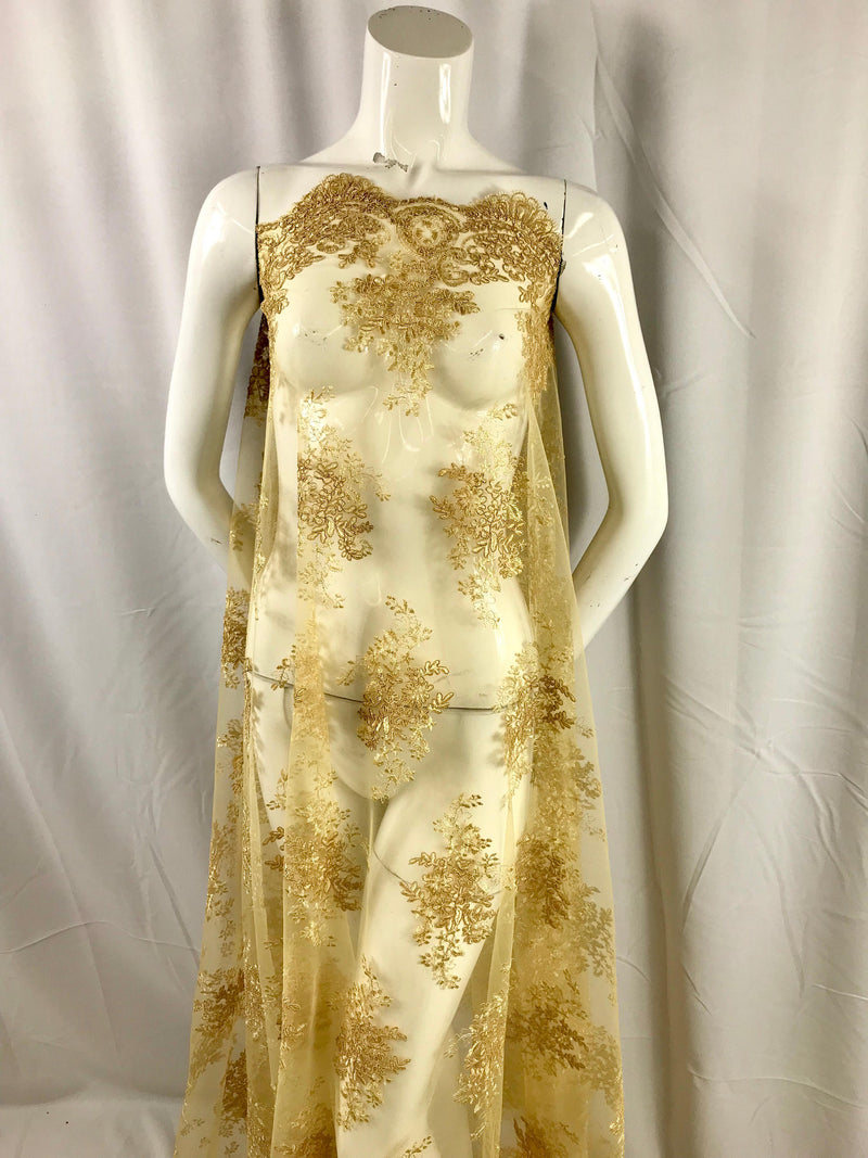 Gold flowers embroider on a mesh lace- wedding-bridal-prom-nightgown-dresses-apparel-fashion-decorations-sold by the yard.