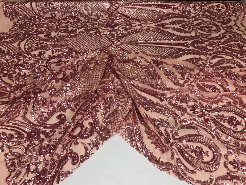 Dusty rose princess design embroider with shiny sequins on a 4 way stretch mesh-sold by the yard.