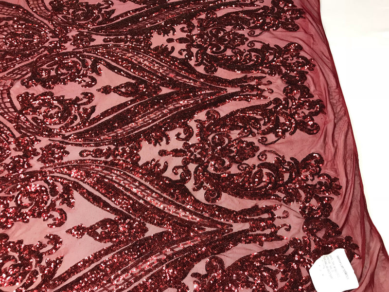 Burgundy empire design embroider with shiny sequins on a 4 way Stretch power mesh-sold by the yard.