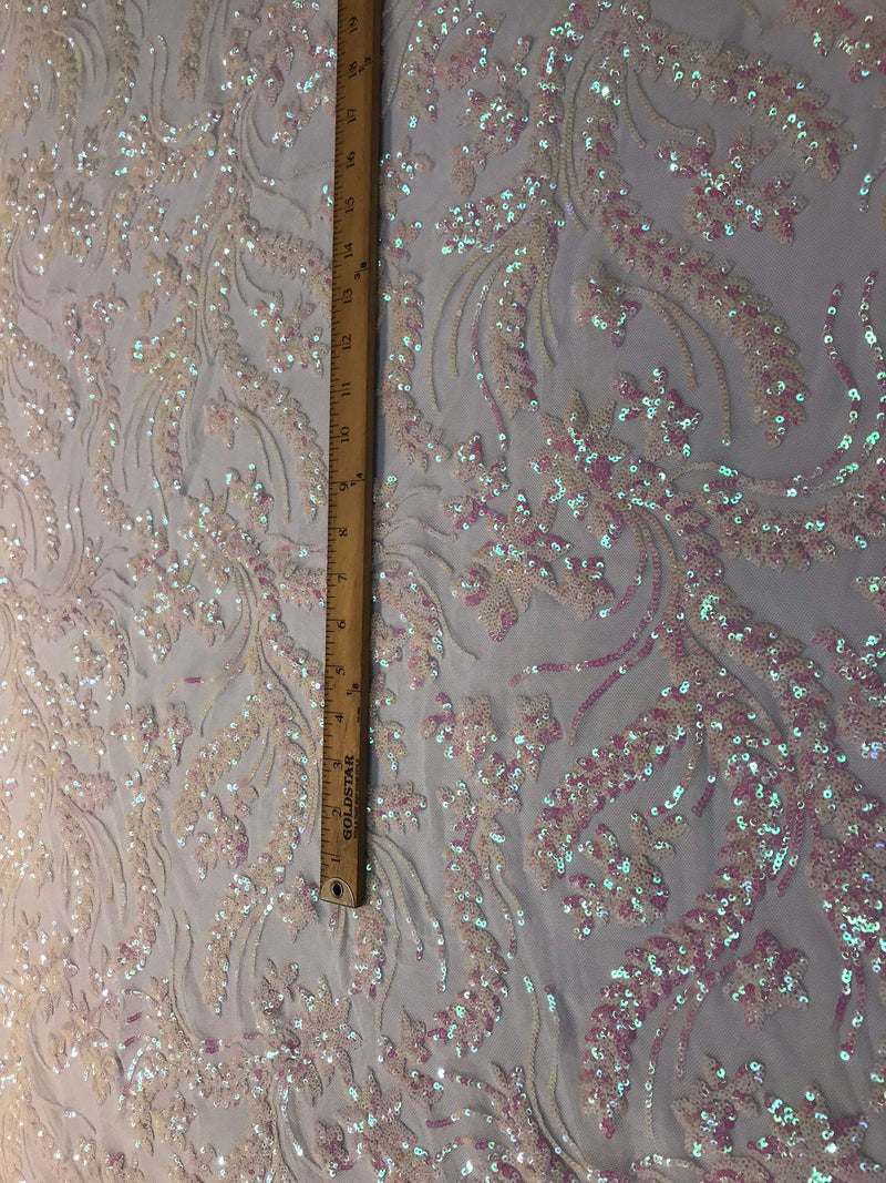 Pink iridescent sequins vine design embroidery on a white 4 way stretch mesh-sold by the yard.
