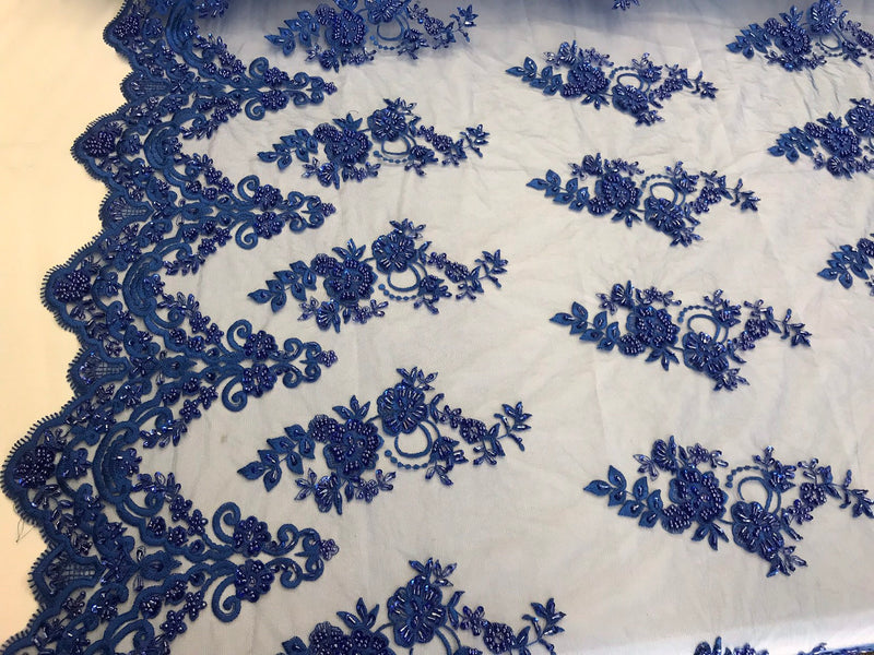 Royal blue hand beaded floral design embroidery with shiny sequins on a mesh lace-dresses-apparel-fashion-prom-nightgown-sold by the yard.