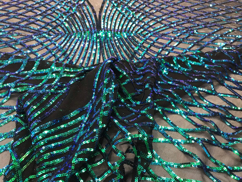 Iridescent green sequin diamond design embroidery on a black 4 way stretch mesh-sold by yard.