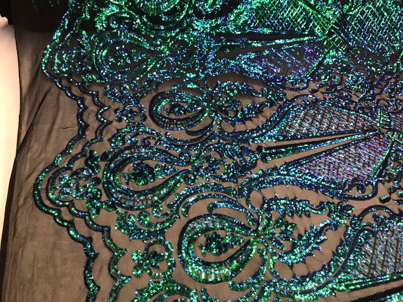 Green princess design iridescent sequins embroidery on a 4 way stretch black mesh-dresses-apparel-prom-nightgown-fashion-sold by the yard.