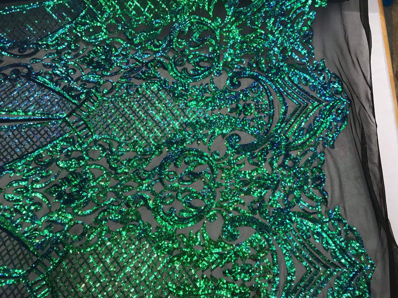 Green princess design iridescent sequins embroidery on a 4 way stretch black mesh-dresses-apparel-prom-nightgown-fashion-sold by the yard.