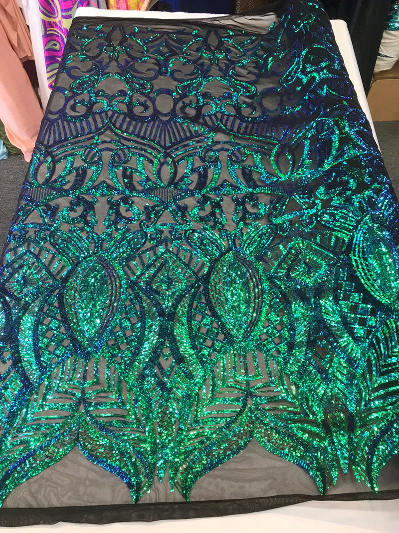 Green royalty iridescent sequins on a 4 way Stretch black mesh lace-dresses-apparel-fashion-prom-nightgown-sold by the yard.