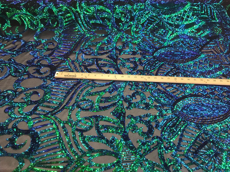 Green royalty iridescent sequins on a 4 way Stretch black mesh lace-dresses-apparel-fashion-prom-nightgown-sold by the yard.