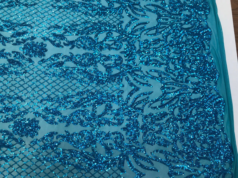 Turquoise shiny sequin damask design embroidery on a 4 way stretch mesh-dresses-prom-nightgown-sold by yard-free shipping.