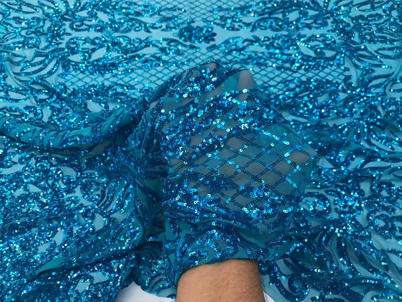 Turquoise shiny sequin damask design embroidery on a 4 way stretch mesh-dresses-prom-nightgown-sold by yard-free shipping.