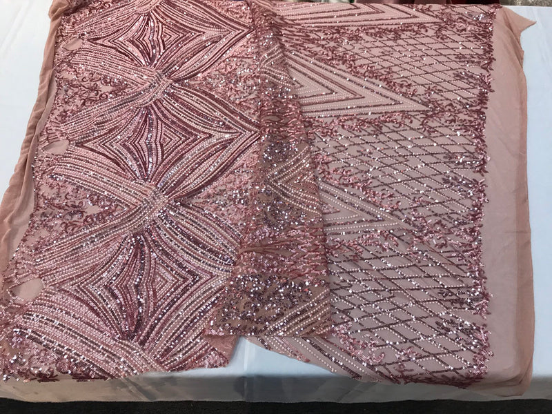 Dusty rose Sequin diamond design embroidery on a 4 way stretch mesh-sold by the yard.