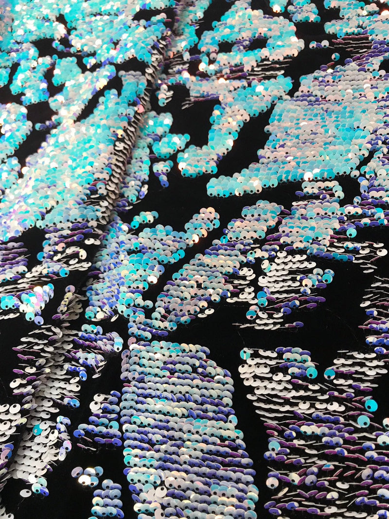 Aqua-white iridescent and reversible sequins embroidery on a 4 way stretch black velvet-dresses-fashion-sold by the yard-free shipping USA.