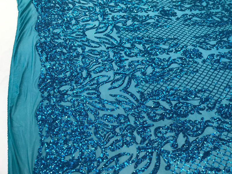 Turquoise shiny sequin damask design embroidery on a 4 way stretch mesh-dresses-prom-nightgown-sold by yard-free shipping.