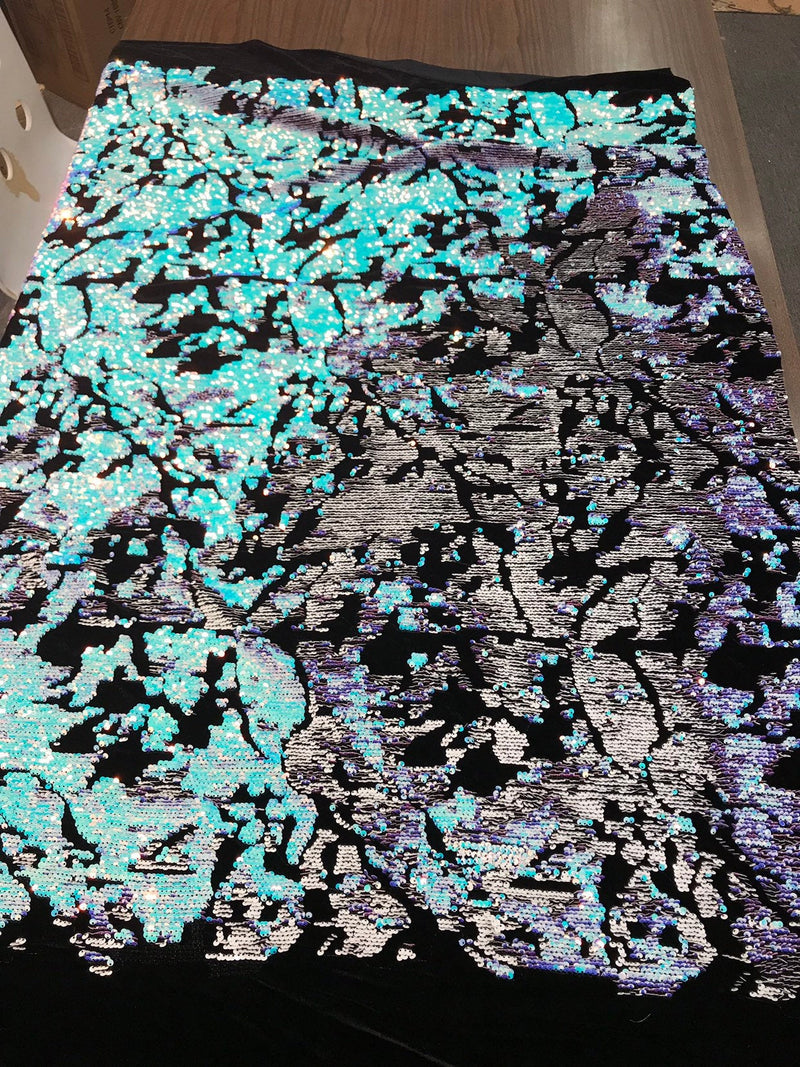 Aqua-white iridescent and reversible sequins embroidery on a 4 way stretch black velvet-dresses-fashion-sold by the yard-free shipping USA.