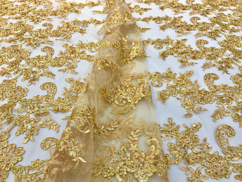 Metallic gold floral design embroidery on a mesh lace with sequins and cord-dresses-fashion-apparel-prom-nightgown-sold by the yard-