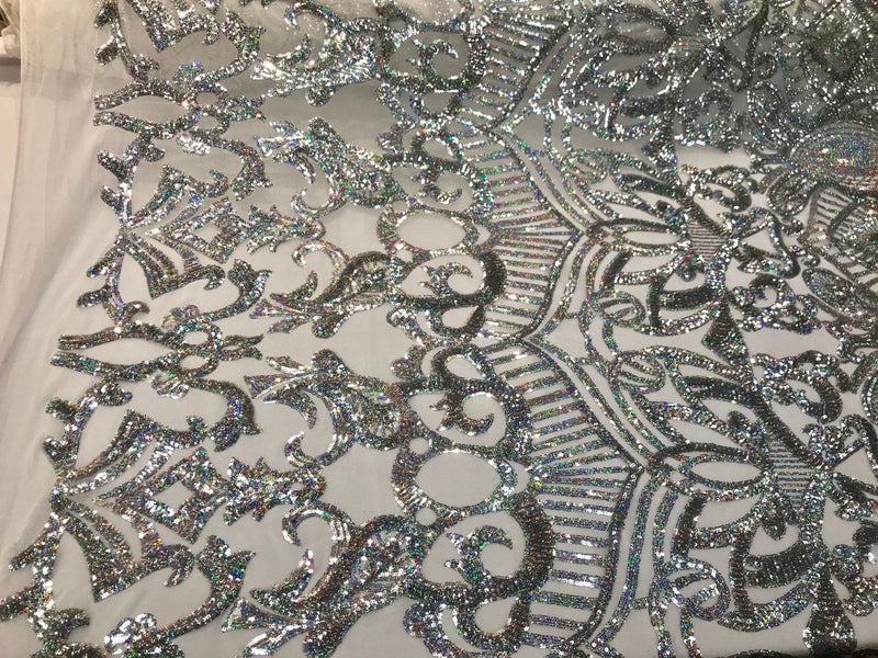 Silver iridescent shiny sequin royalty design embroidery on a 4 way stretch mesh-prom-nightgown-sold by the yard-free shipping in the USA.