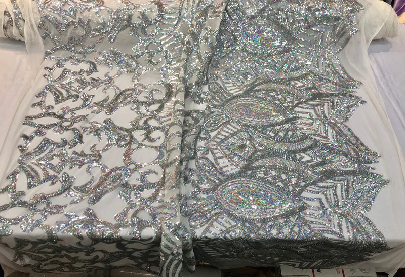 Silver iridescent shiny sequin royalty design embroidery on a 4 way stretch mesh-prom-nightgown-sold by the yard-free shipping in the USA.