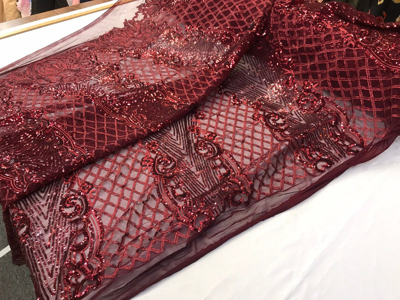 Burgundy glitter sequins damask design on a 4 way stretch black mesh lace-prom-nightgown-sold by the yard-free shipping in the USA.