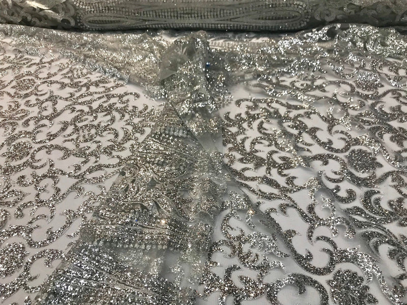 Silver shiny glitter damask design on a mesh lace-dresses-fashion-apparel-prom-nightgown-decorations-sold by the yard.